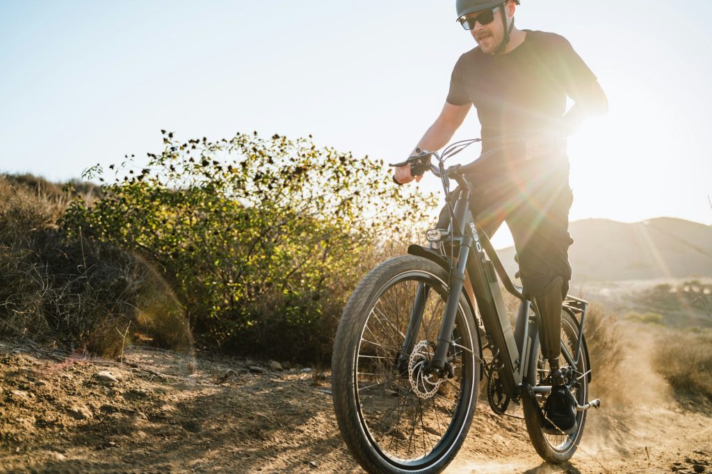 ELECTRIC bike rider going uphill